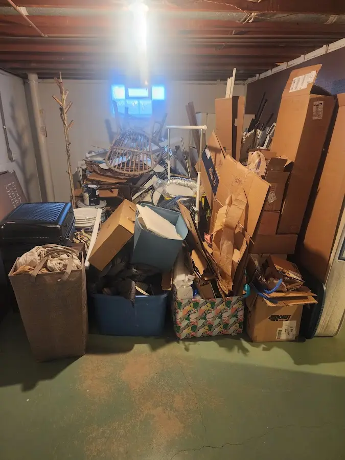 Roll-off dumpster container at job site for 2 Yard Dumpster Rental in Lemon Hill